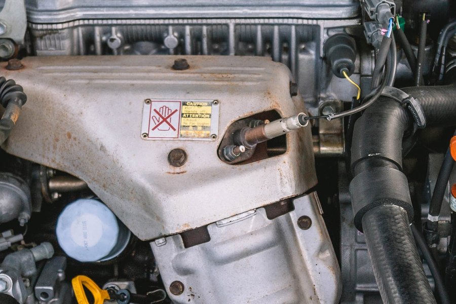 An oxygen sensor, a key component in diagnosing P0420 codes.