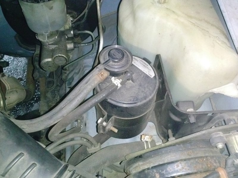 An image showing the charcoal canister and its connections within a vehicle's EVAP system.