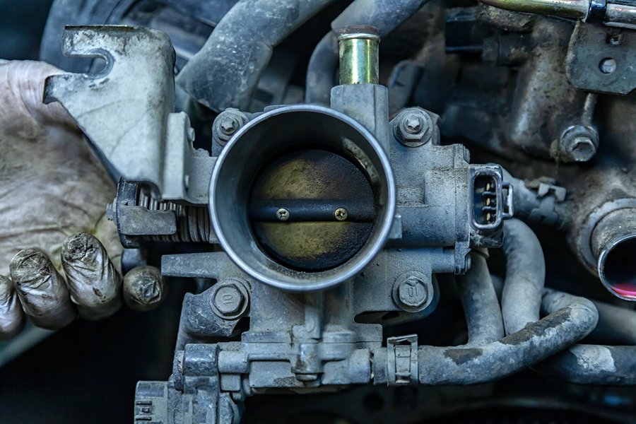 A view of a throttle body, the component that controls airflow into the engine.