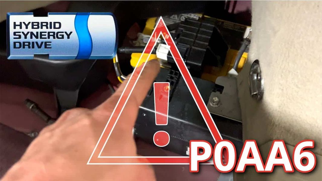 Toyota Prius dashboard displaying P0AA6 fault code and hybrid system warning lights