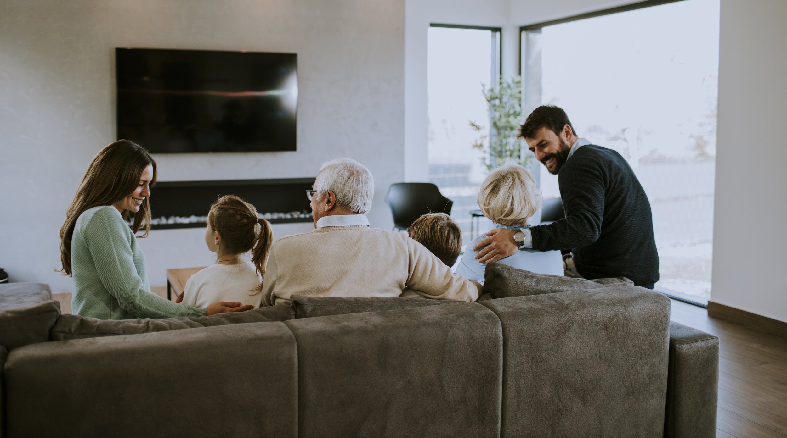 family talking in modern living room