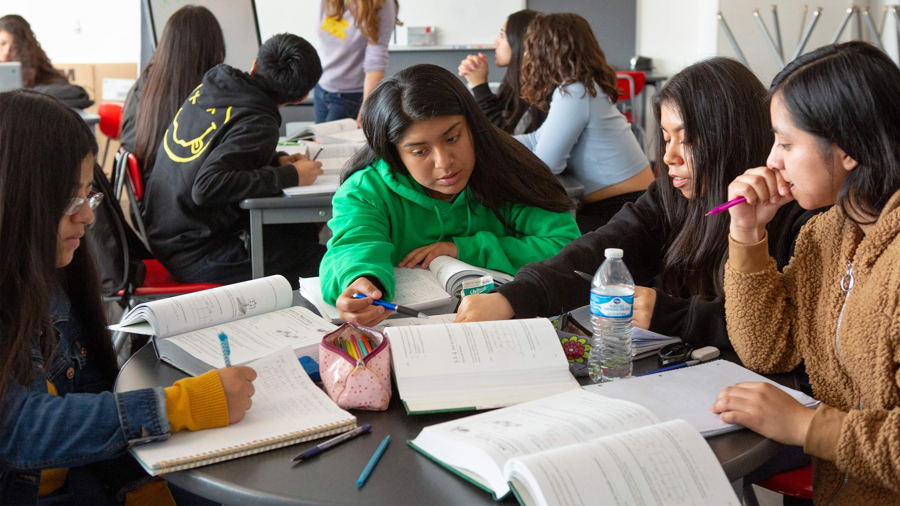 students solving problems in classroom