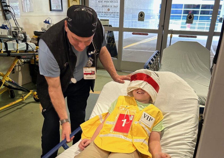Paramedics and medical staff participating in a disaster drill simulation