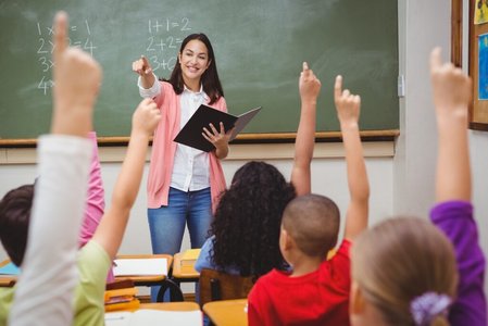 classroom teacher interacting with students