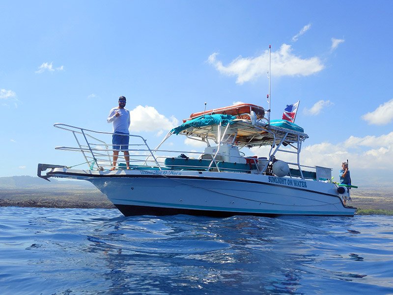 A robust boat sailing on the ocean.