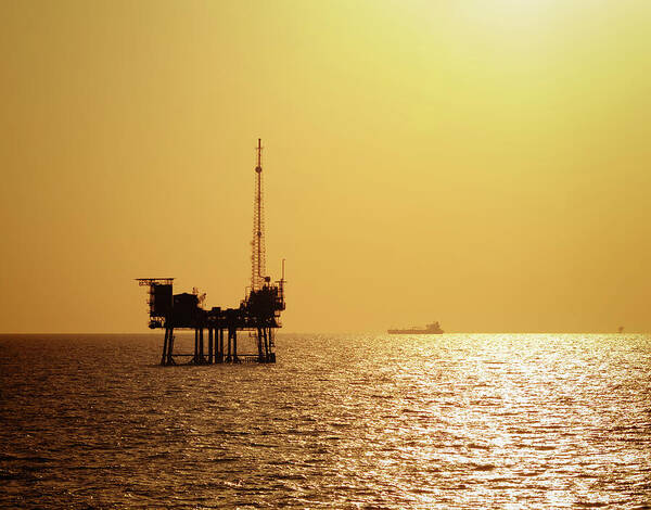 oil rig sea sunset