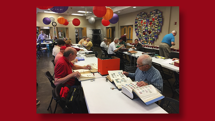philatelic stamps auction table
