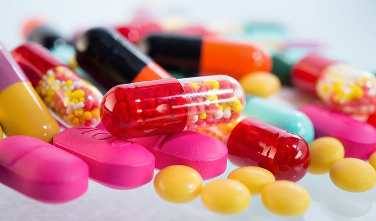 pharmacological pills and laboratory instruments