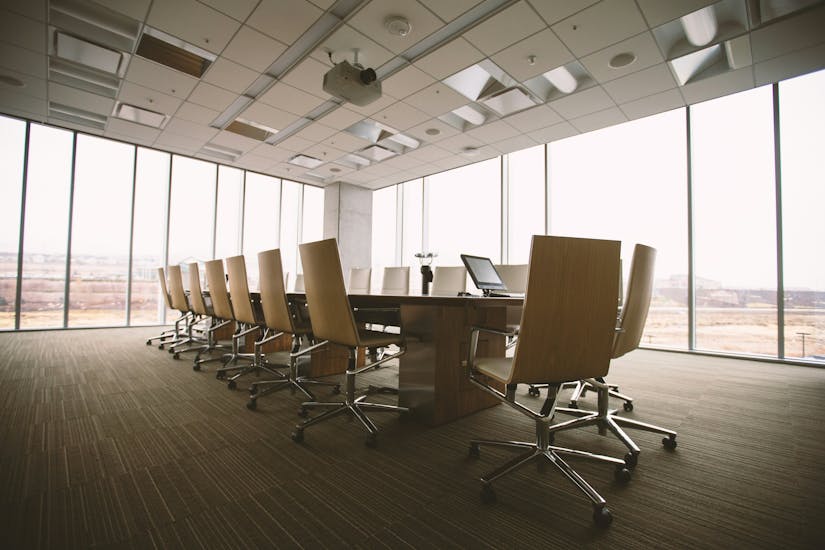 office building meeting financial documents