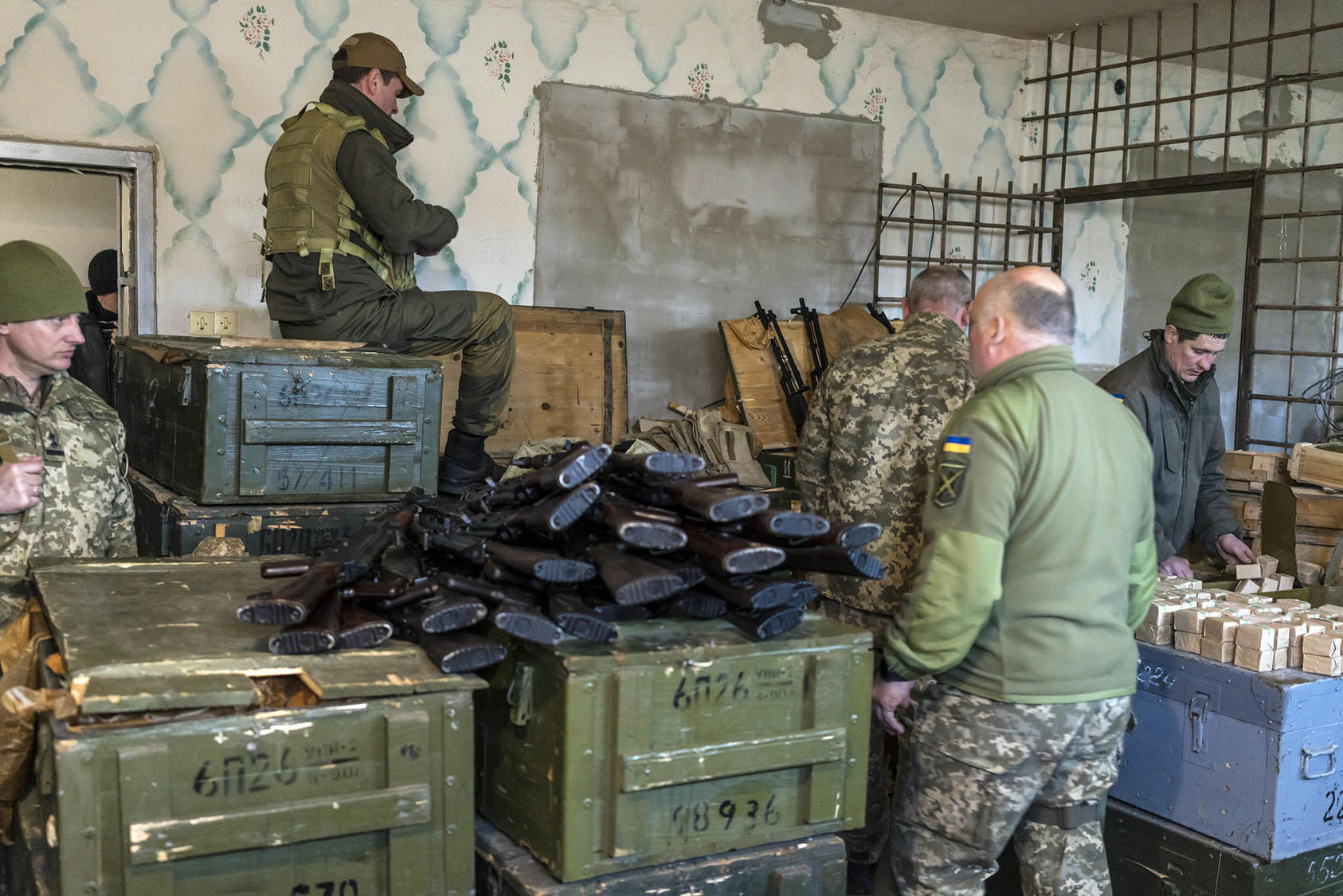 military equipment and humanitarian aid in landscape
