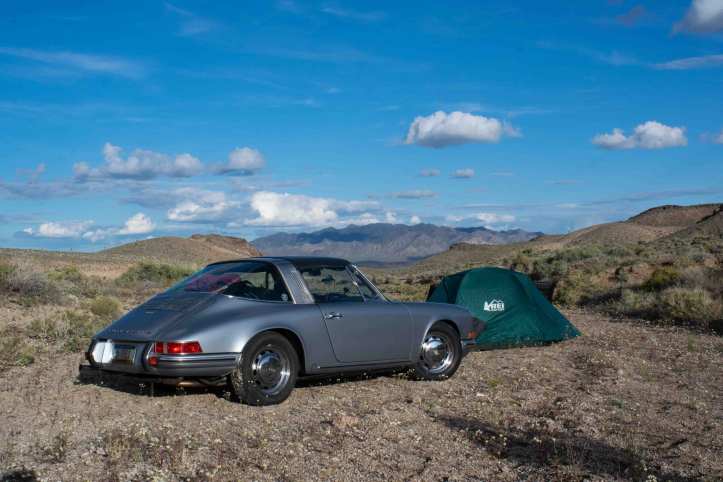 classic porsche car on scenic road