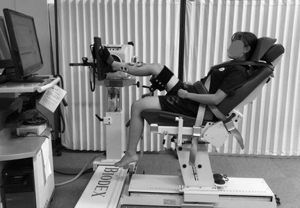 clinical examination of patient with posture and therapy equipment