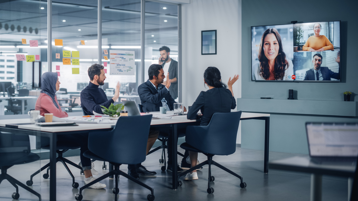 physical meeting room with chat interface