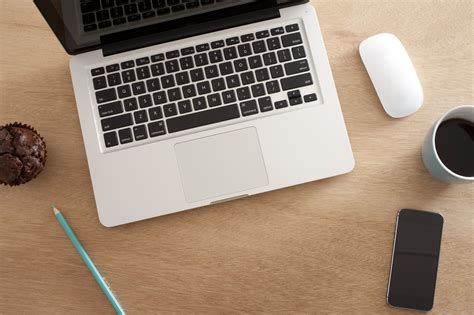 workspace with computer and notes on desk