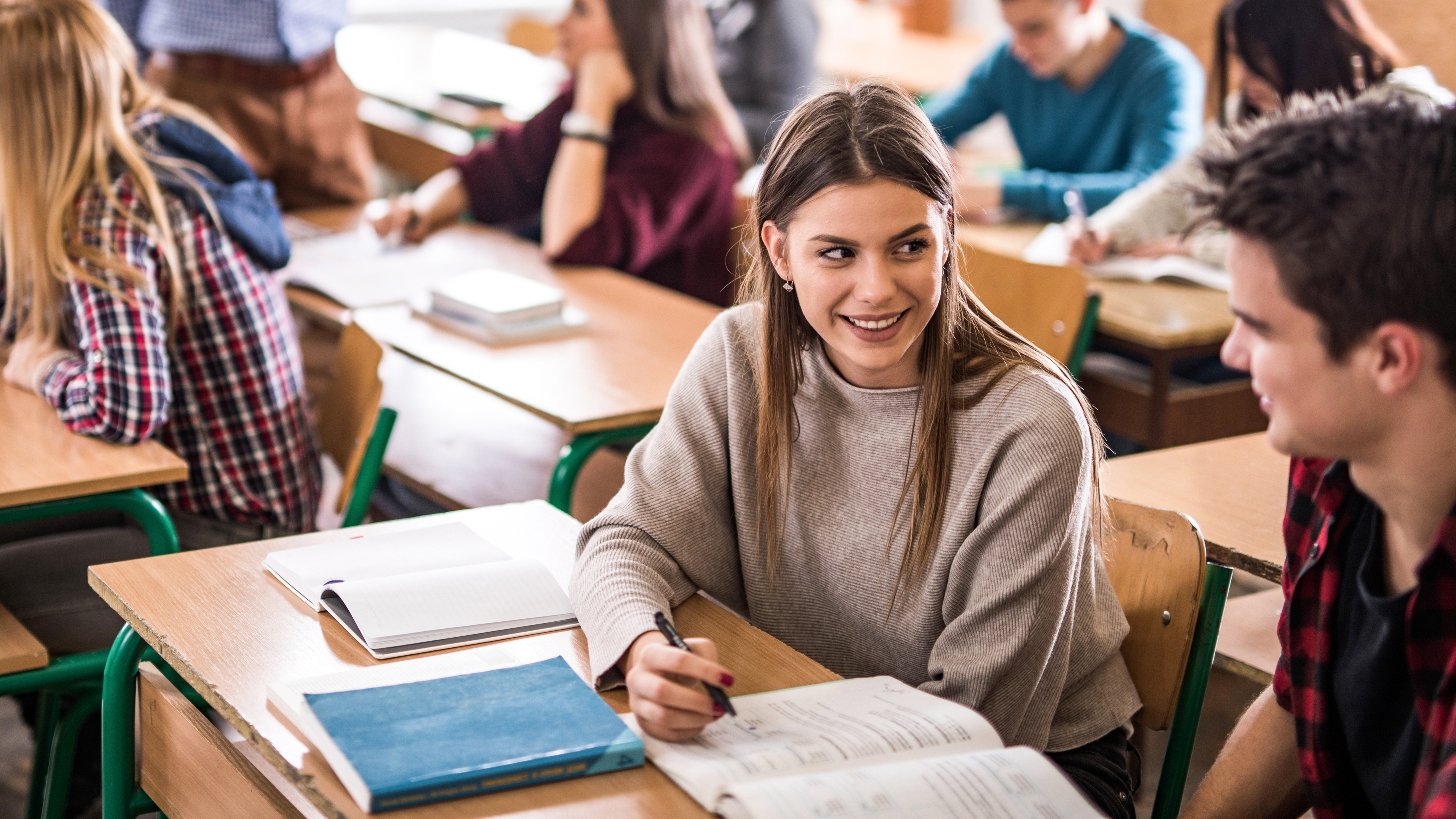 students speaking in classroom