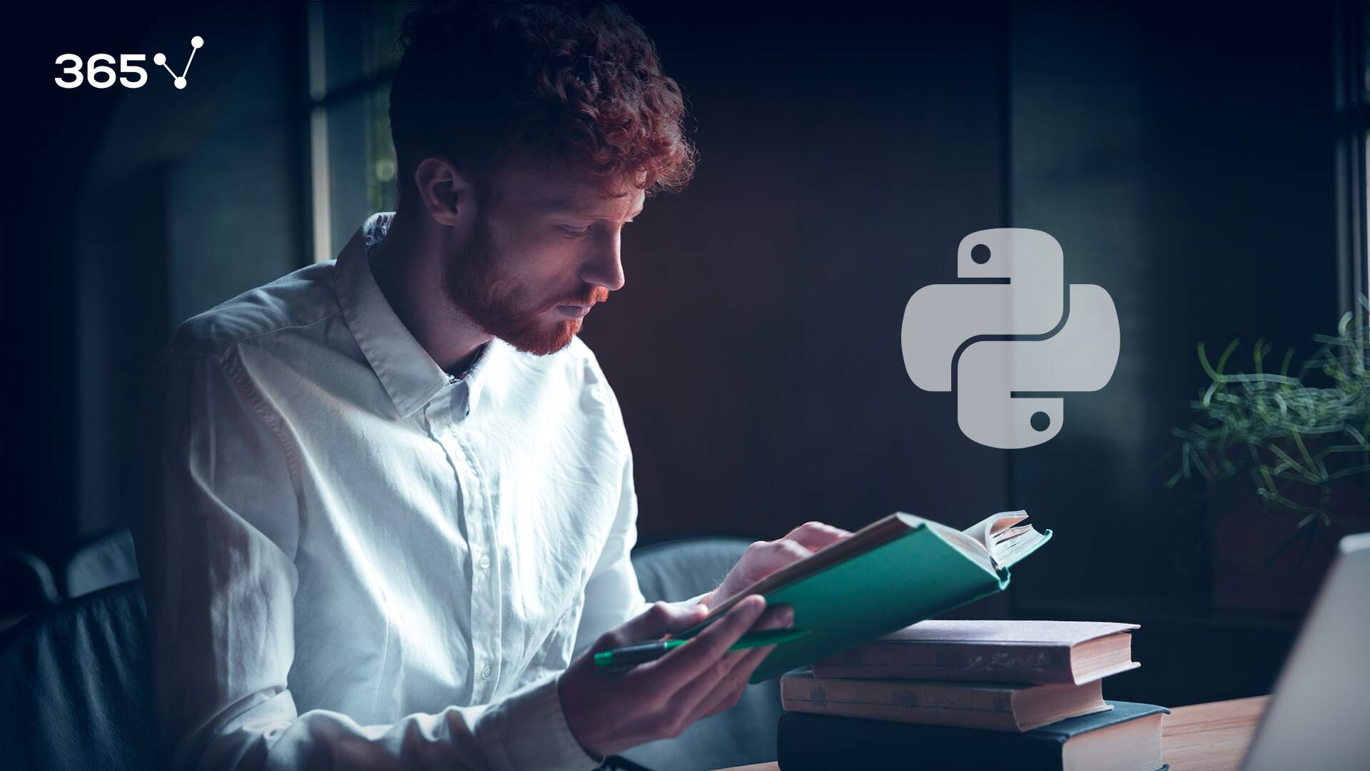 python programming books and laptop