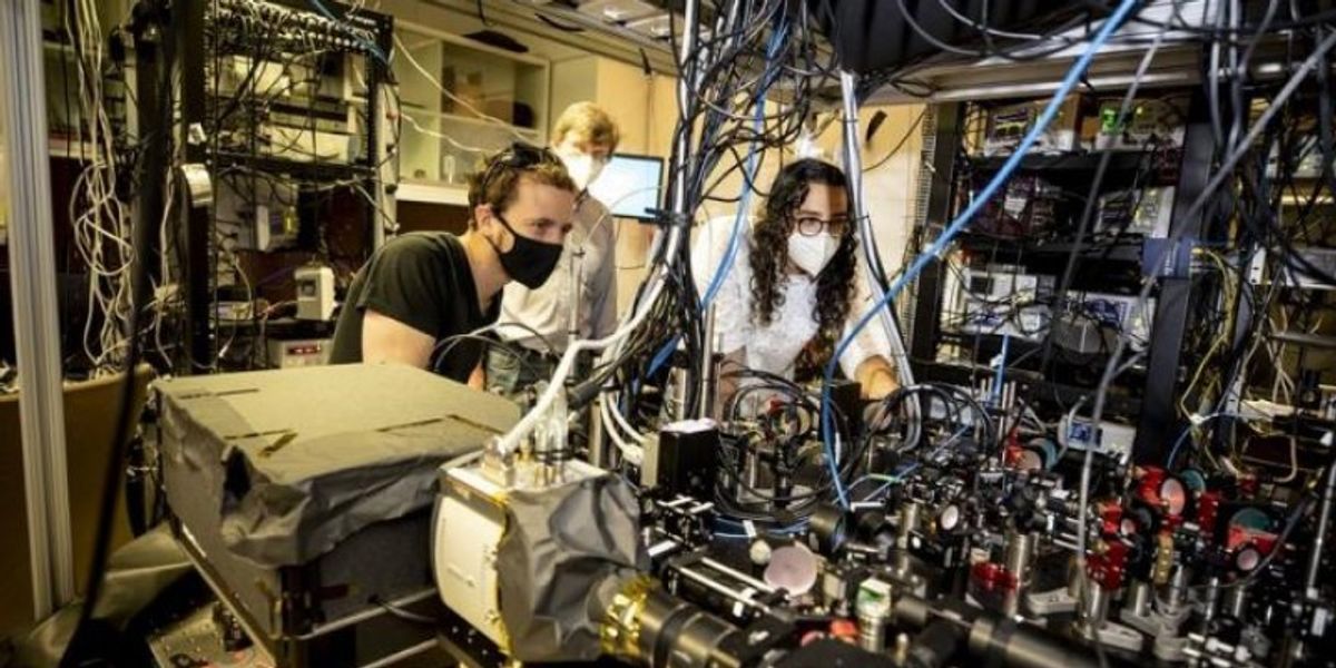 scientist working quantum simulation lab