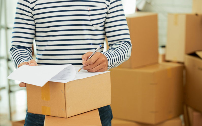 migration documents and packing boxes