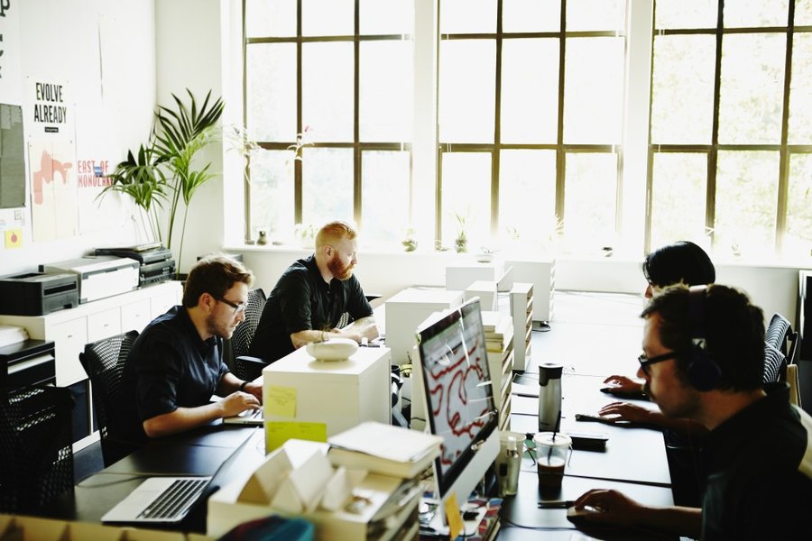 Diverse group of office workers collaborating