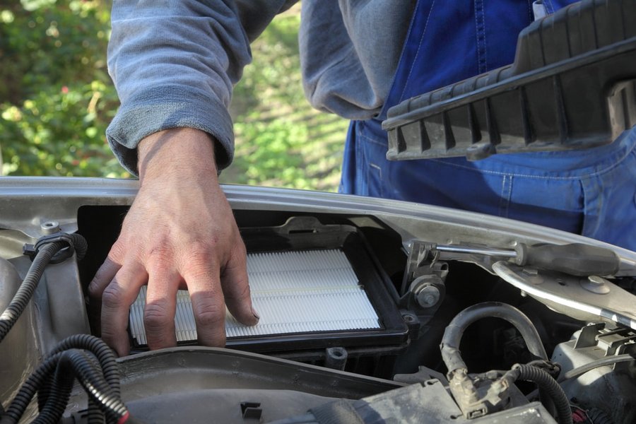 The engine air filter, typically housed in a black plastic box under the hood, is essential for engine health.