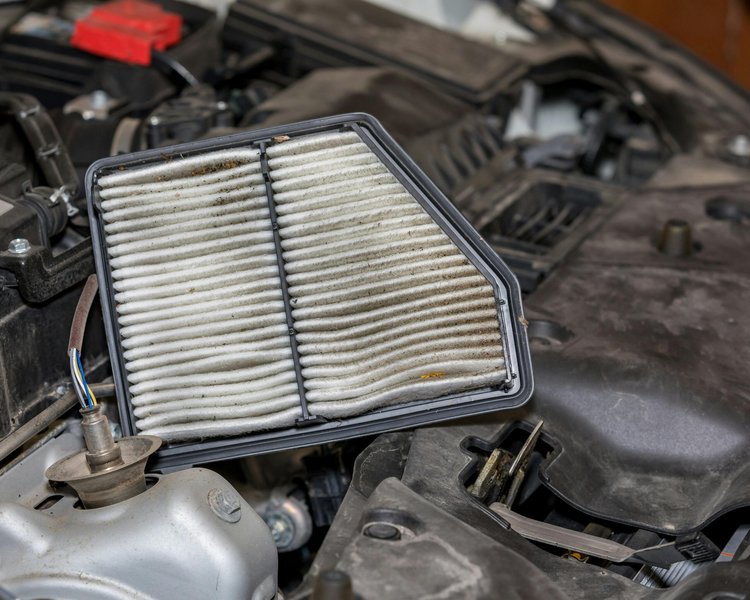 Often, the cabin air filter resides behind the glove compartment.