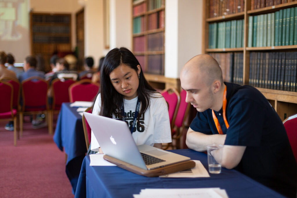 students researching project ideas in a library