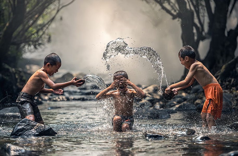 Children playing in a river
