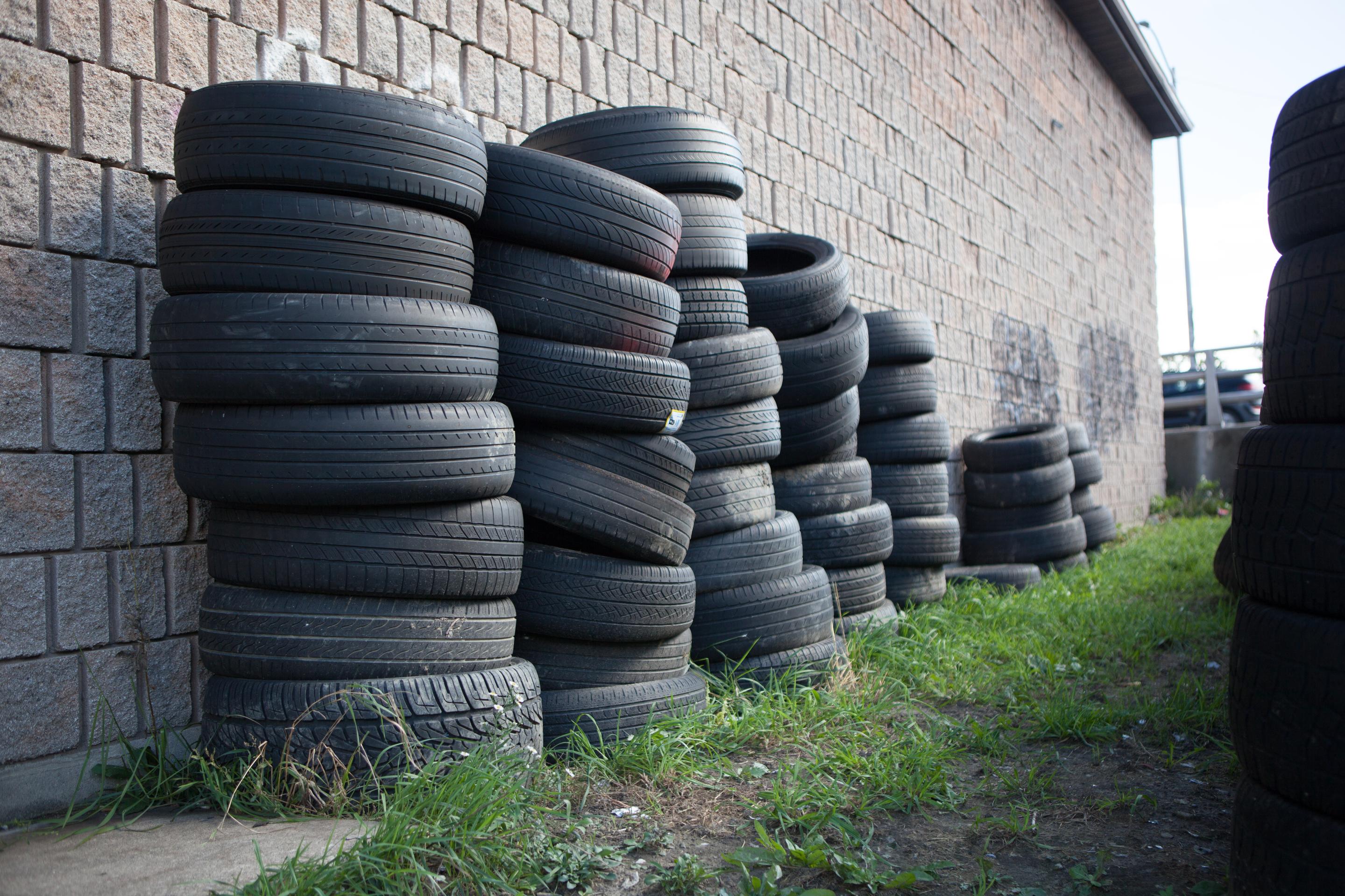 urban construction site with concrete structures and tires