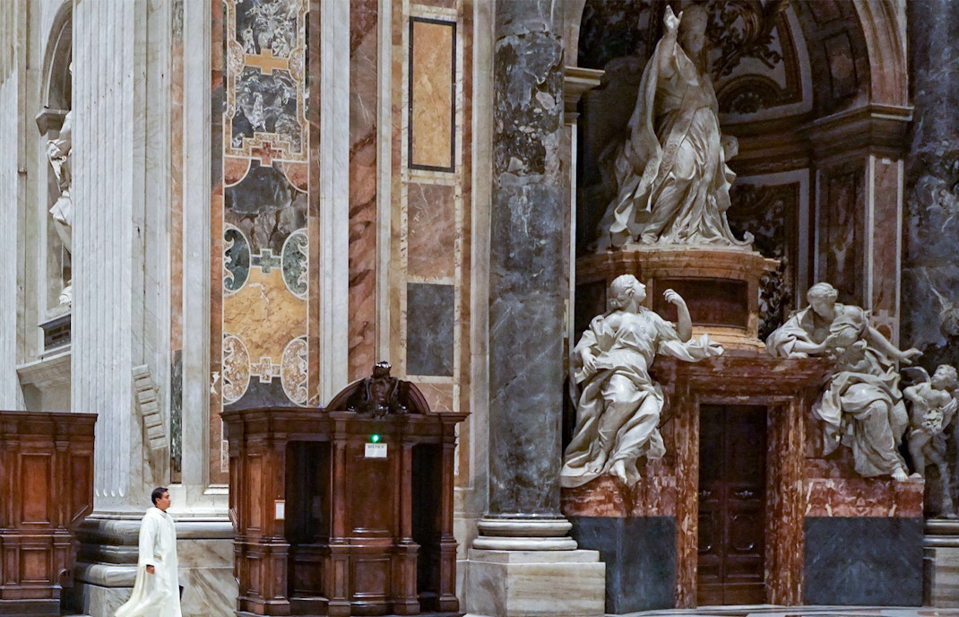 historical statue and cathedral interior
