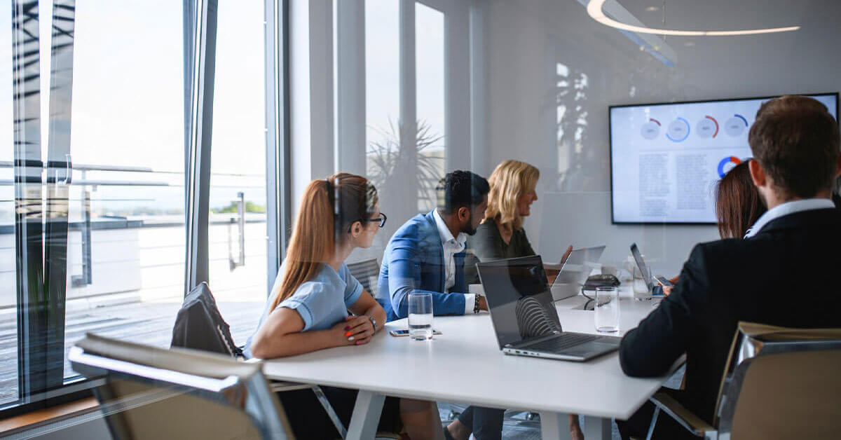 modern office workspace with digital screens