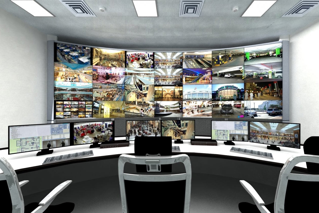 corporate office building with computer screens