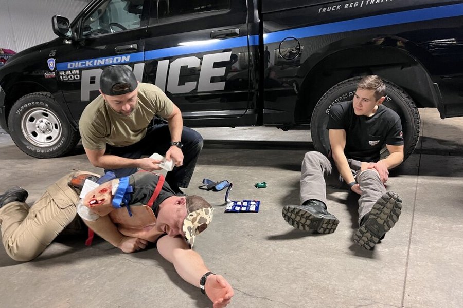 Image of first responders, representing the need for resources in critical situations, analogous to resource needs in enforcement.