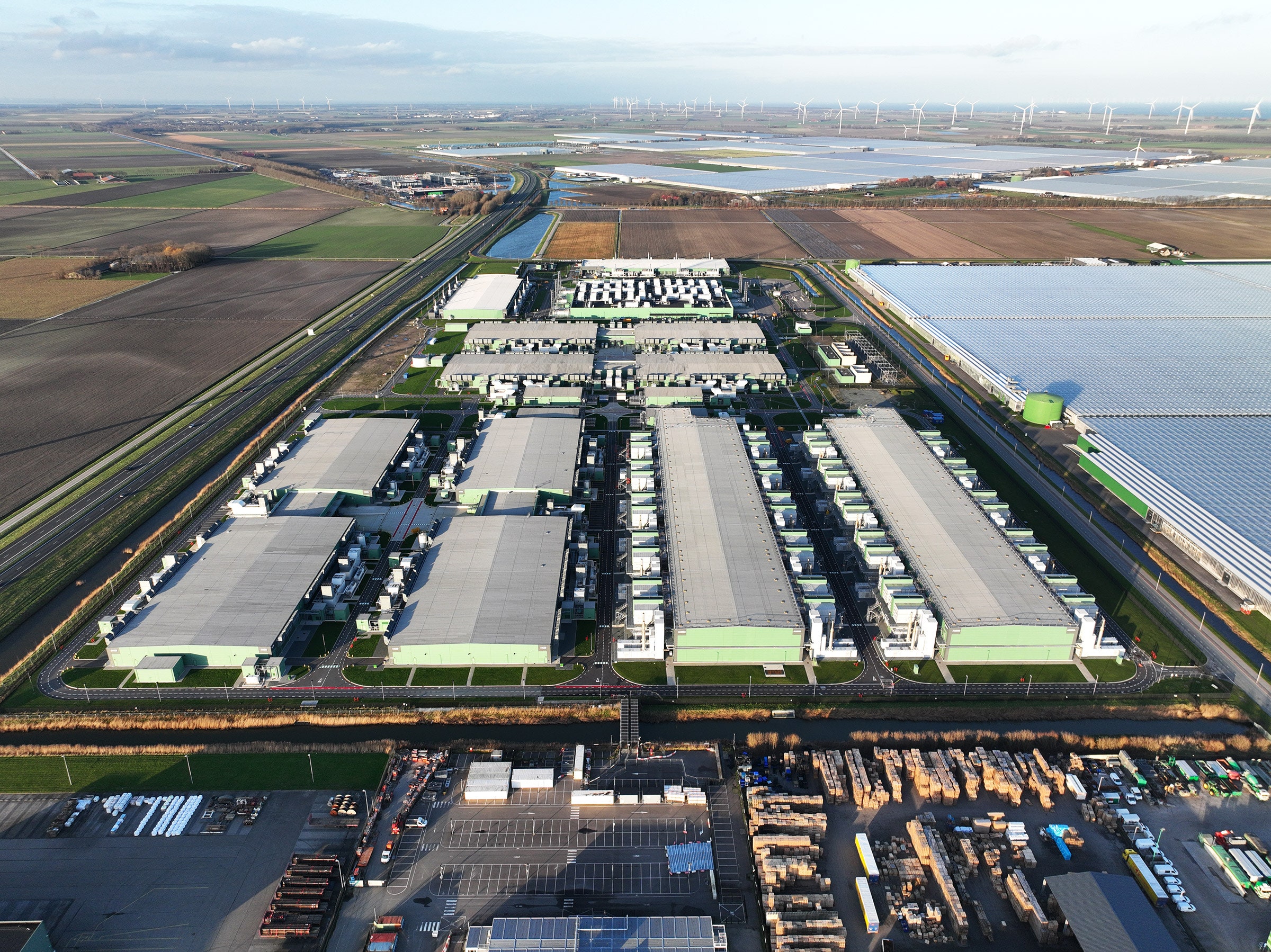 aerial view of farmland and modern IT data center