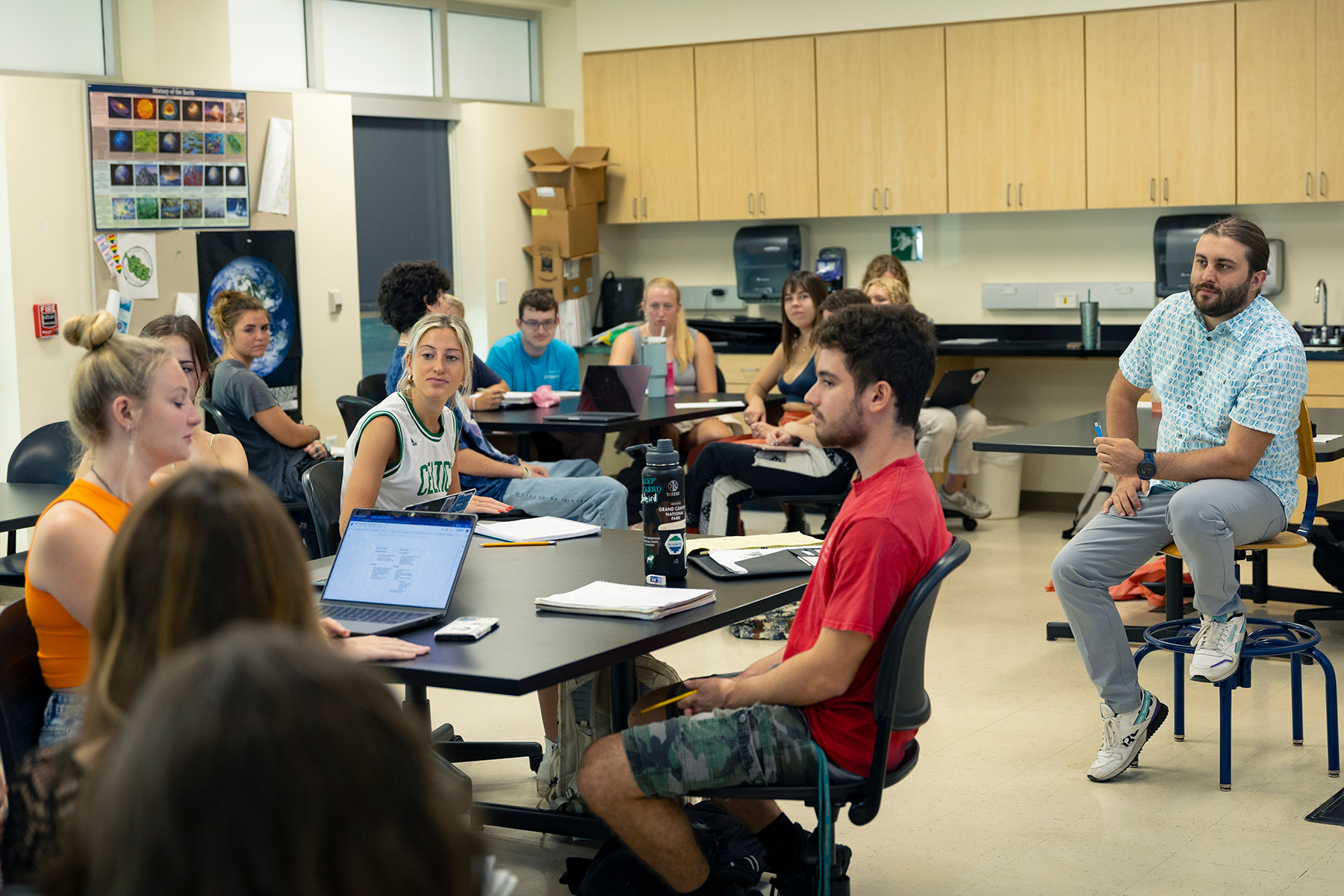 scenic academic campus, student group discussion in classroom