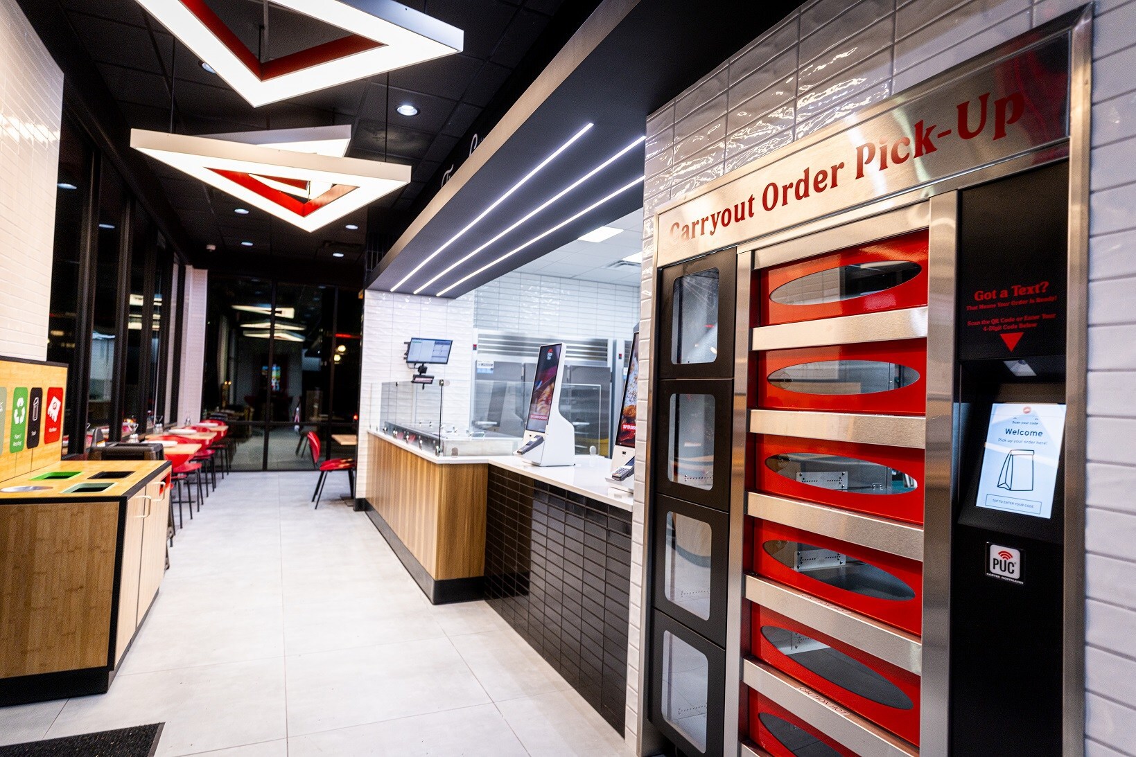 modern restaurant interior technology self service kiosk