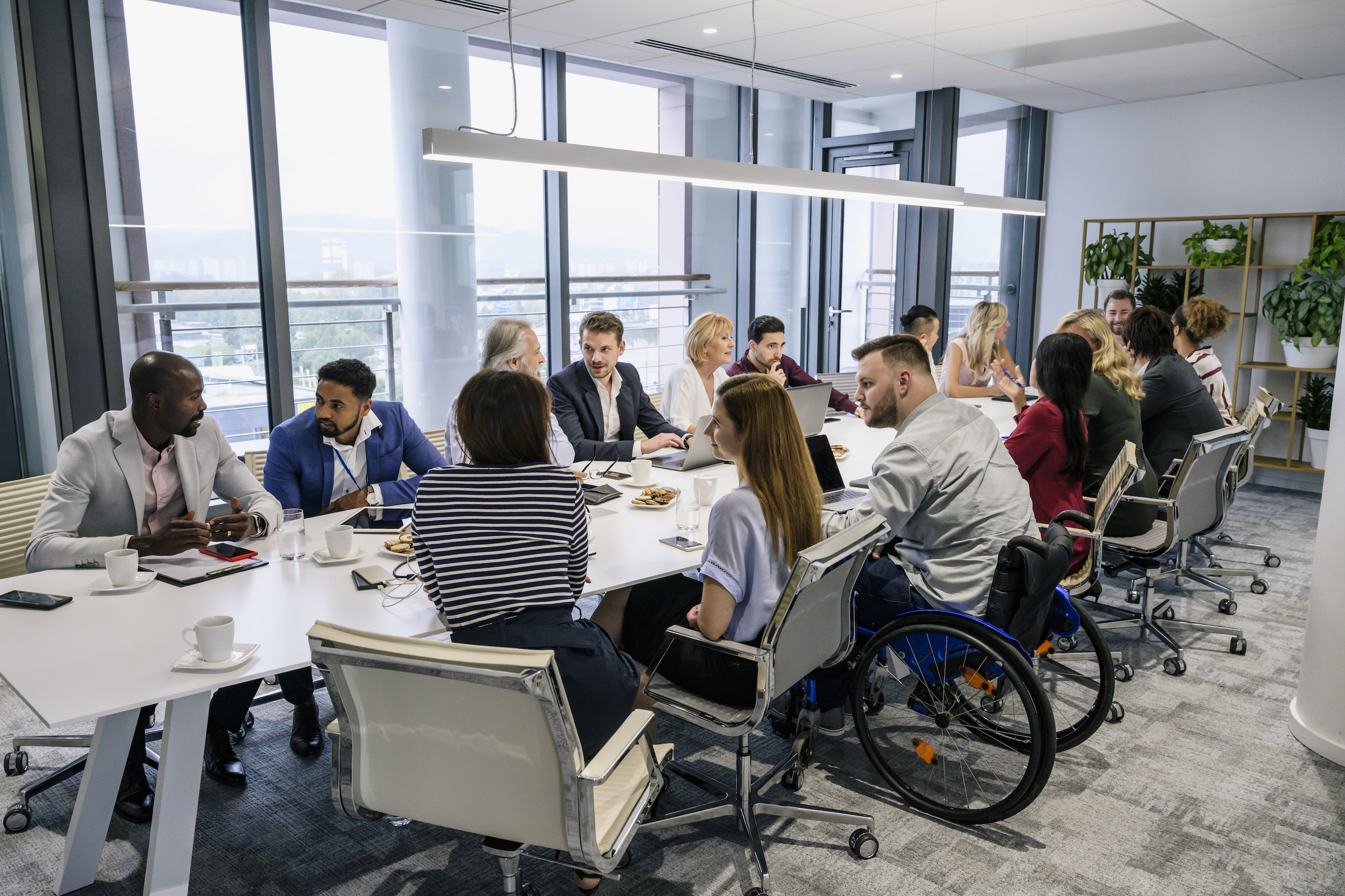 experienced professionals in corporate boardroom