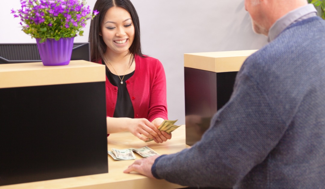 bank service counter and customers