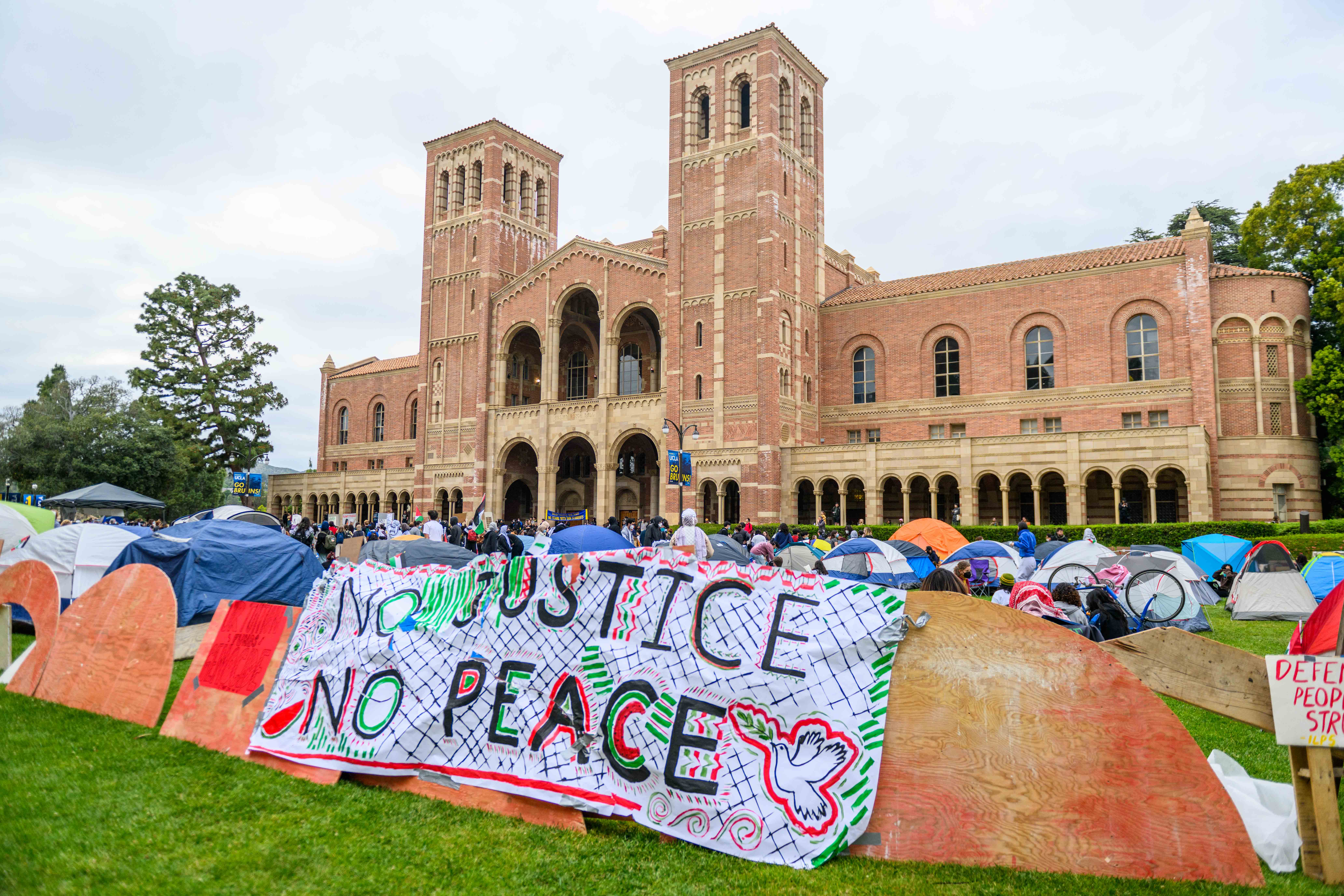 university campus architecture and protest banners