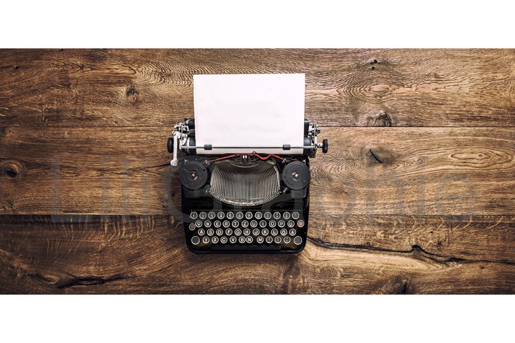 vintage typewriter with papers