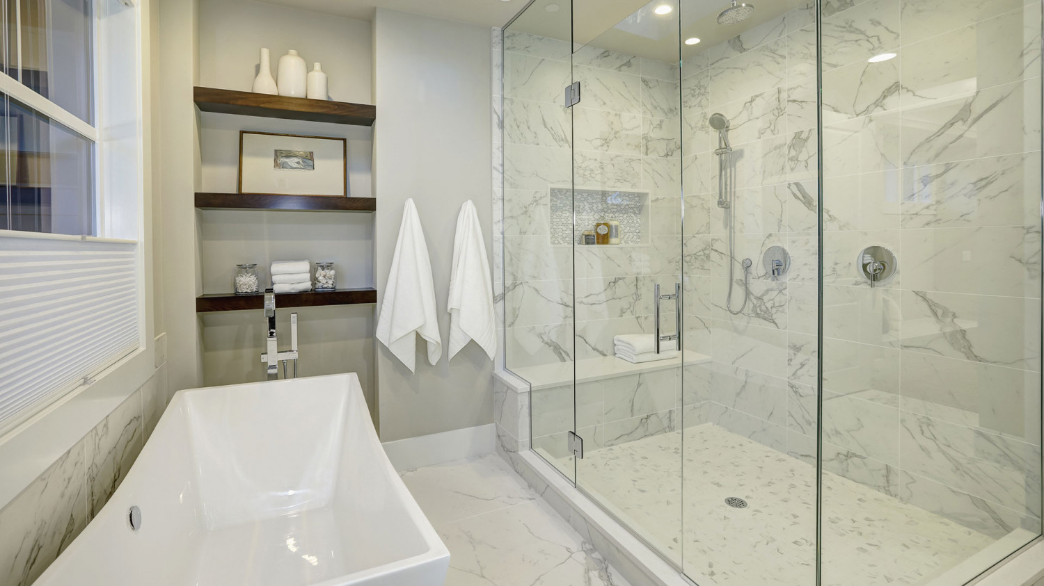 custom shower door installation with engraved glass and counter