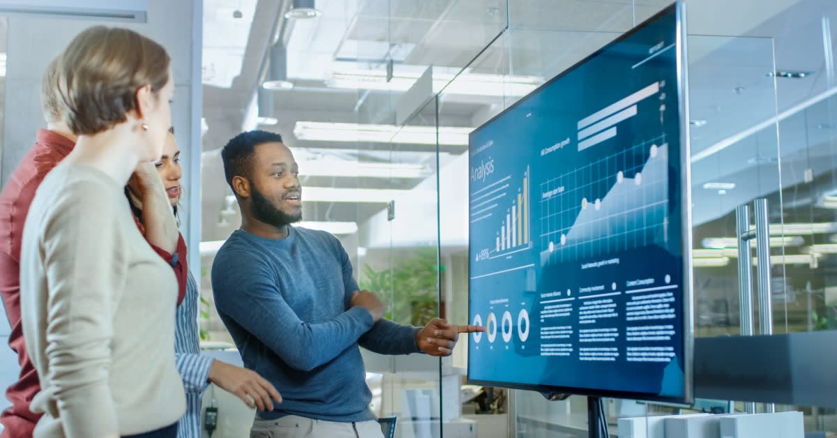 modern office building with data analytics screens