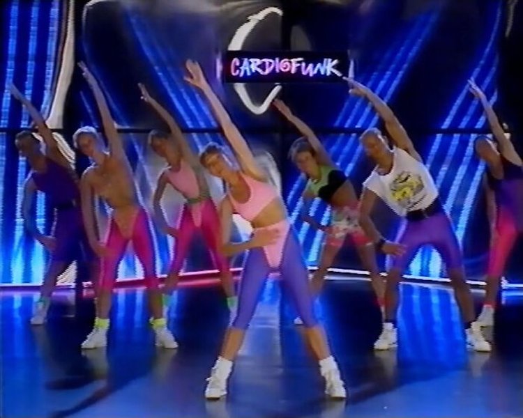 A retro image of an aerobics class from the 1980s, highlighting the historical connection between music and fitness classes.