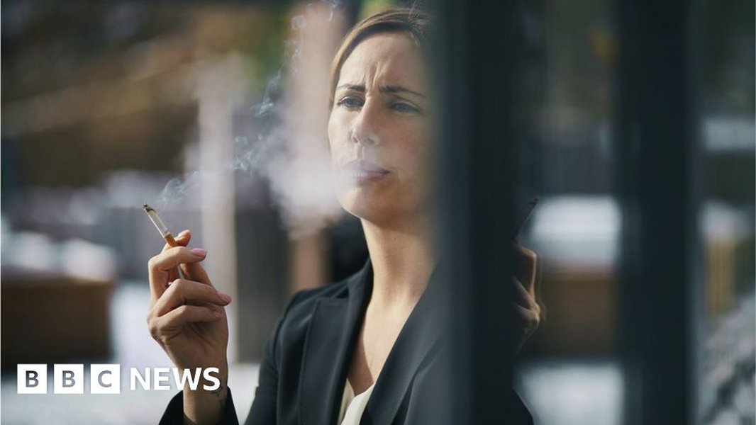 A woman smoking a cigarette