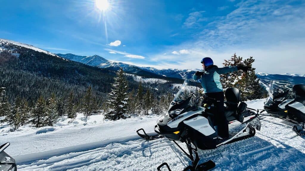 snowmobile riding snowy terrain