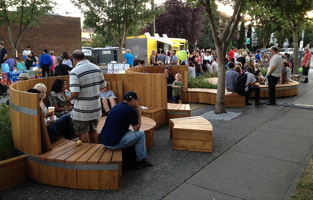 people interacting in public places
