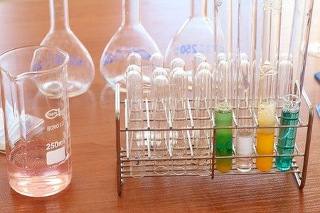 chemical laboratory with test tubes and molecular models