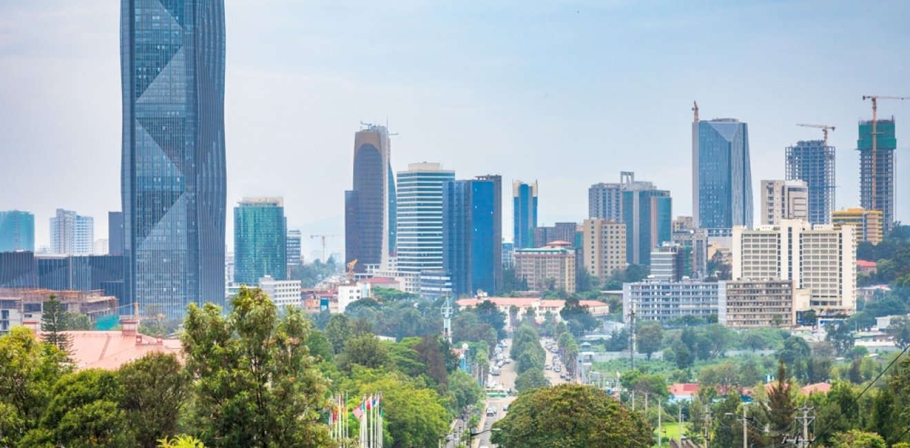 African regional map, diplomatic meeting, urban skyline