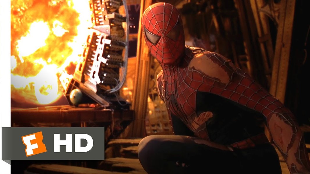 Spider-Man confronting Doctor Octopus on the side of a building.