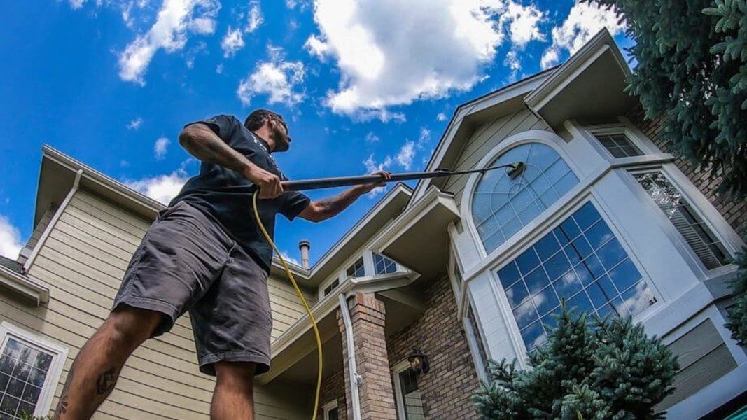 Assortment of professional window cleaning tools and supplies