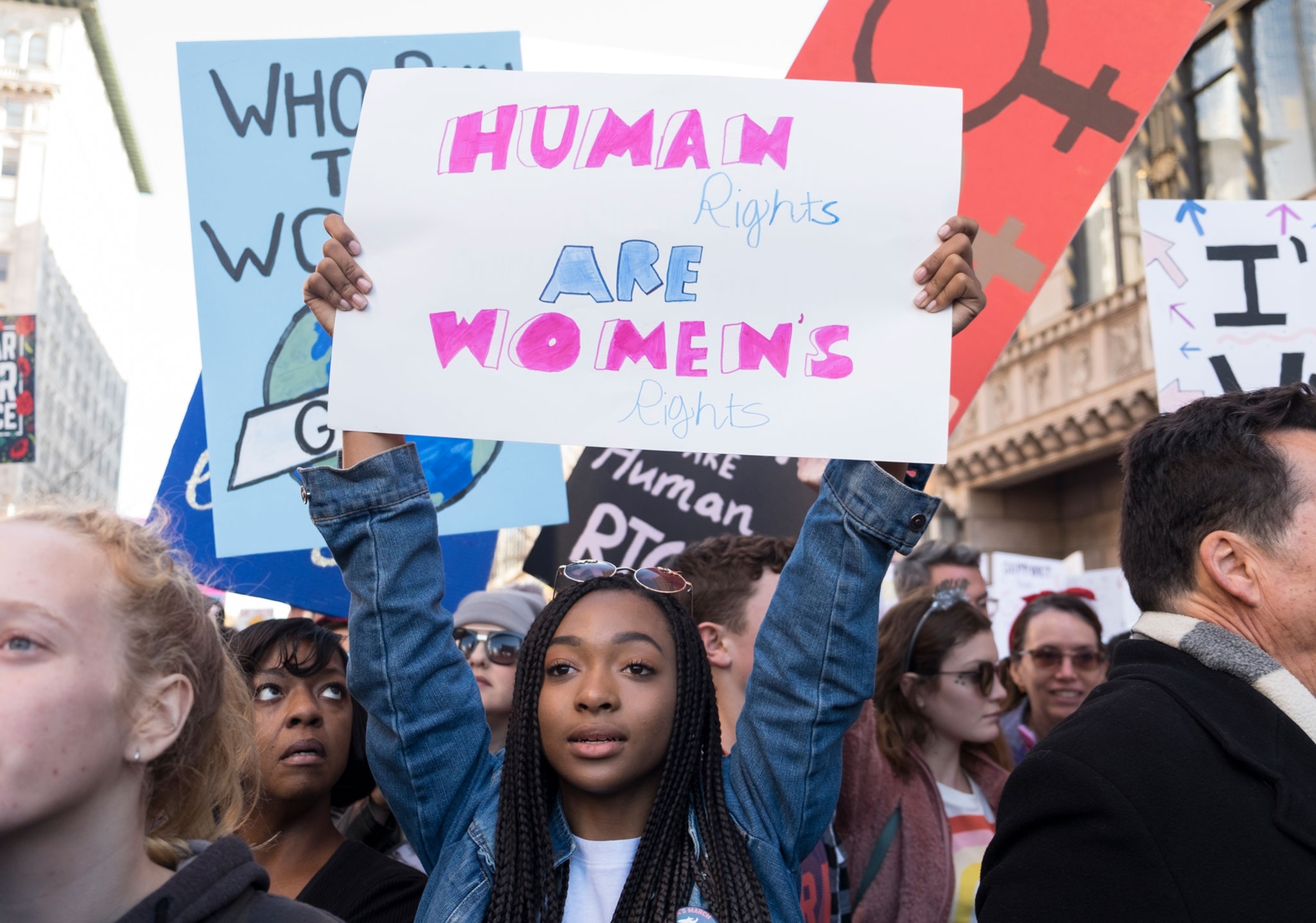 protest citizens holding signs human rights